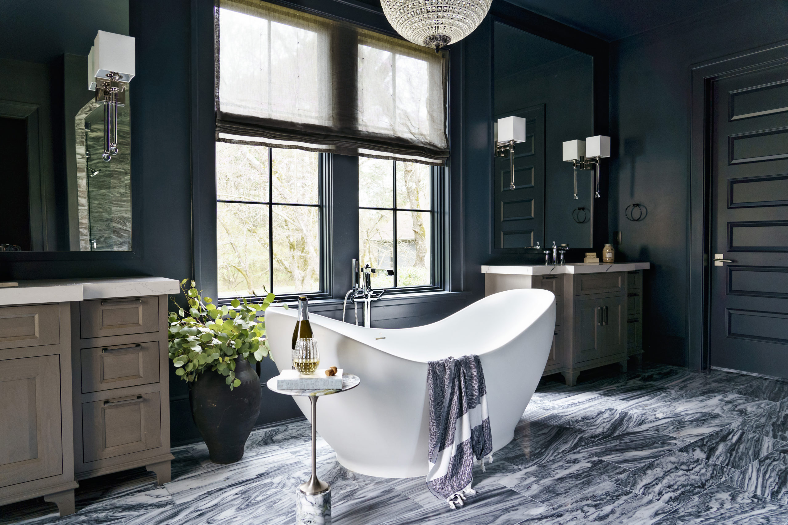 Luxurious Southern-style bathroom with centrally located bathtub.