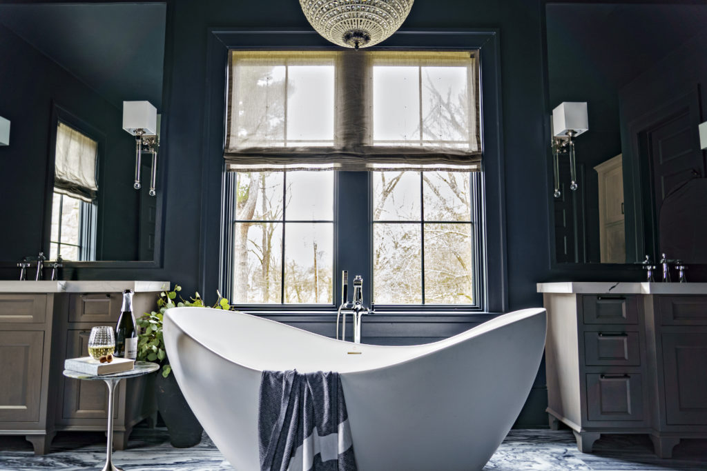 Luxurious Southern-style bathroom with centrally located bathtub.