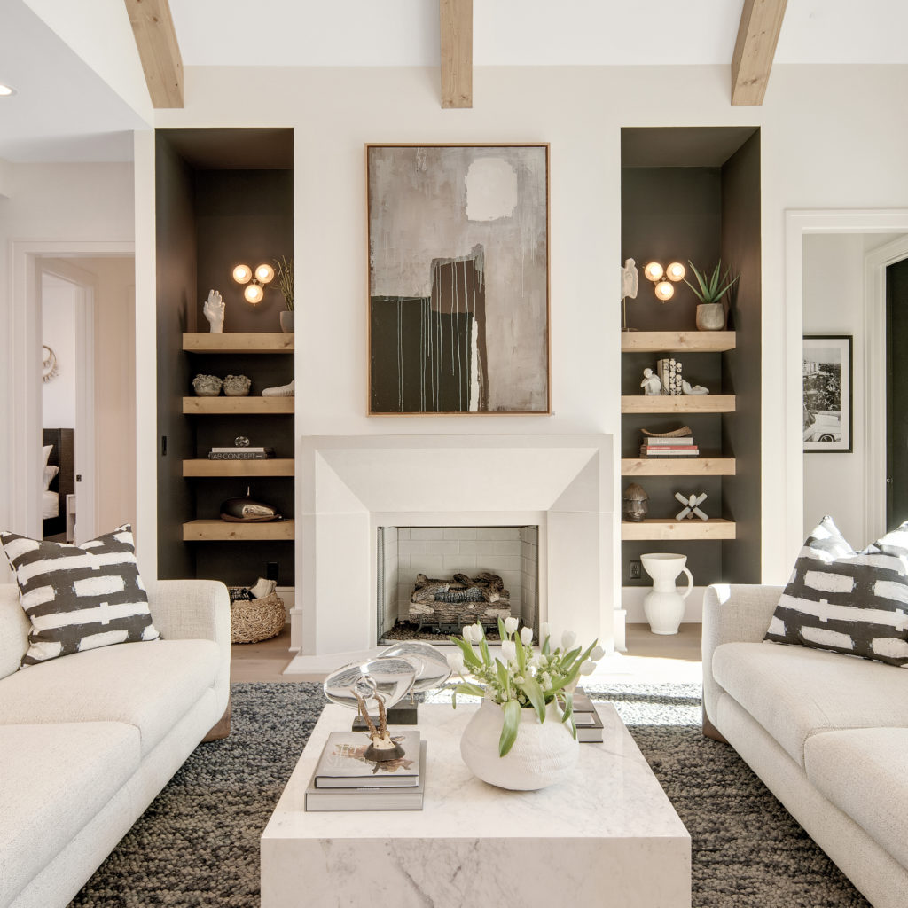 Contemporary living space with a blend of white and wooden tones.