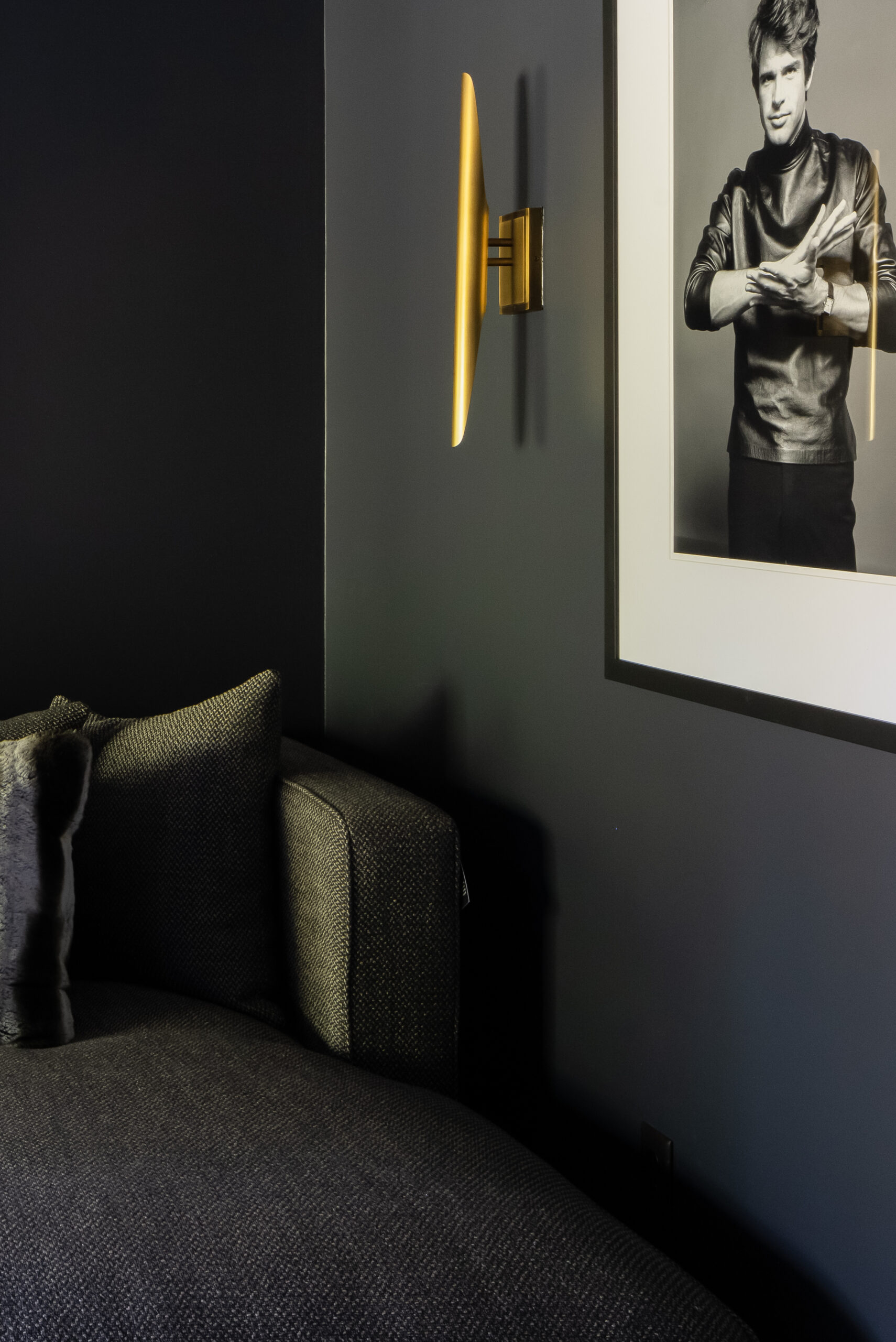 Discover a sultry space in a modern, masculine Memphis home, where art adorns a chic media room.